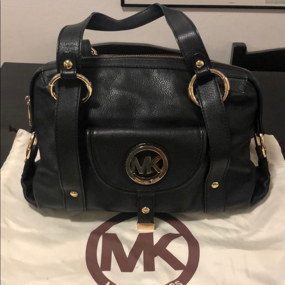 Michael Kors purse, wallet, and storage bag